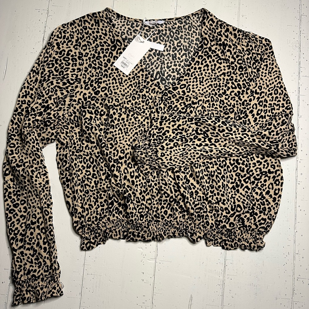 Candies brand new leopard print woman’s shirt size XXL